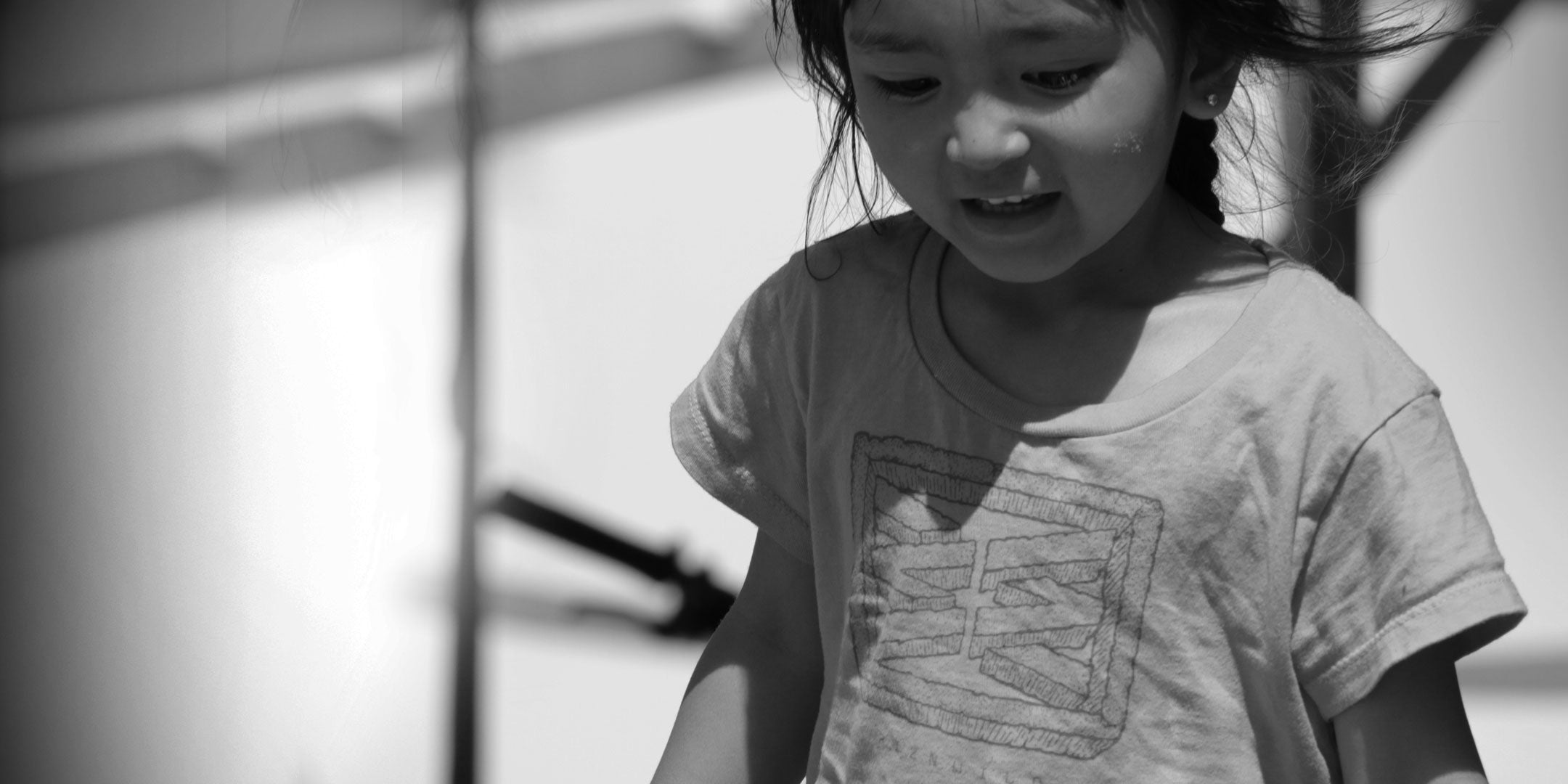 RIZNWILD graphic tee worn by a toddler