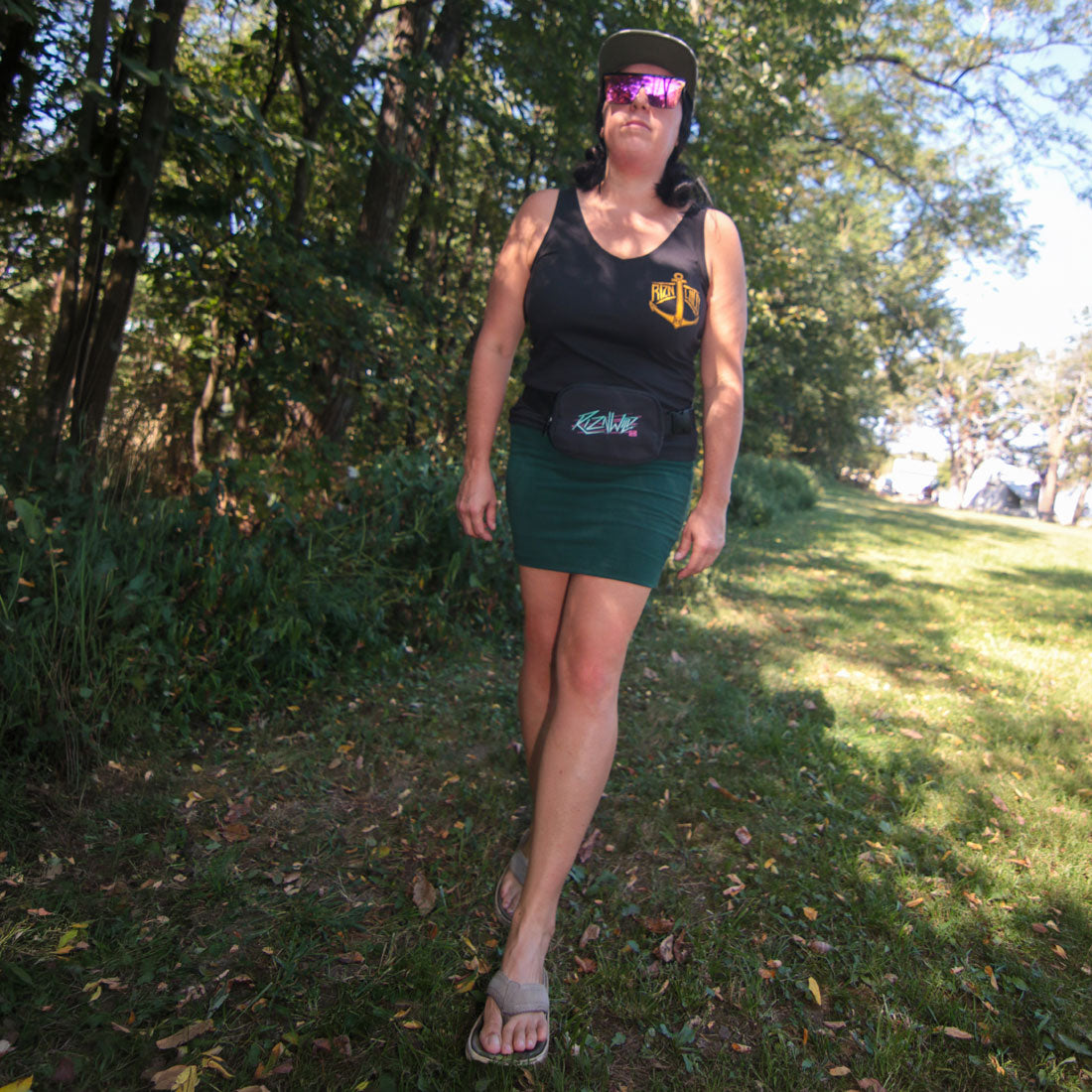 Black RIZNWILD waist bag worn outdoors