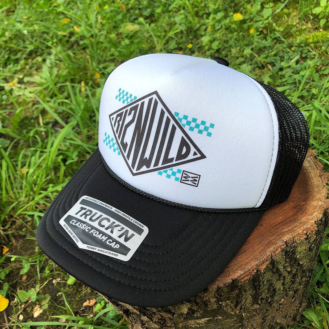 Legend Curved Bill Foam Front Trucker Hat in Black/White