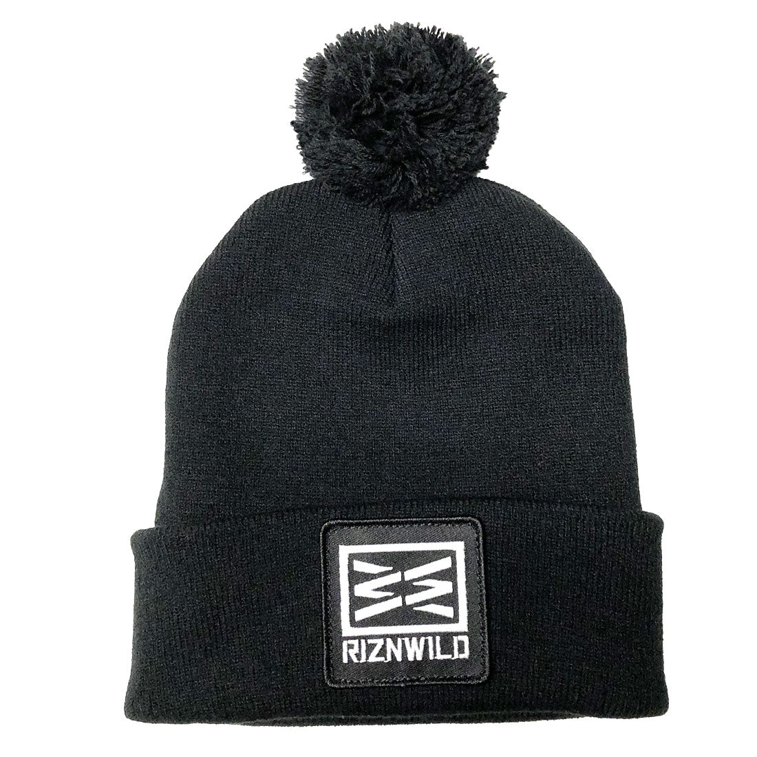 A black cuffed beanie with a pom-pom on top and a RIZNWILD patch on the front.