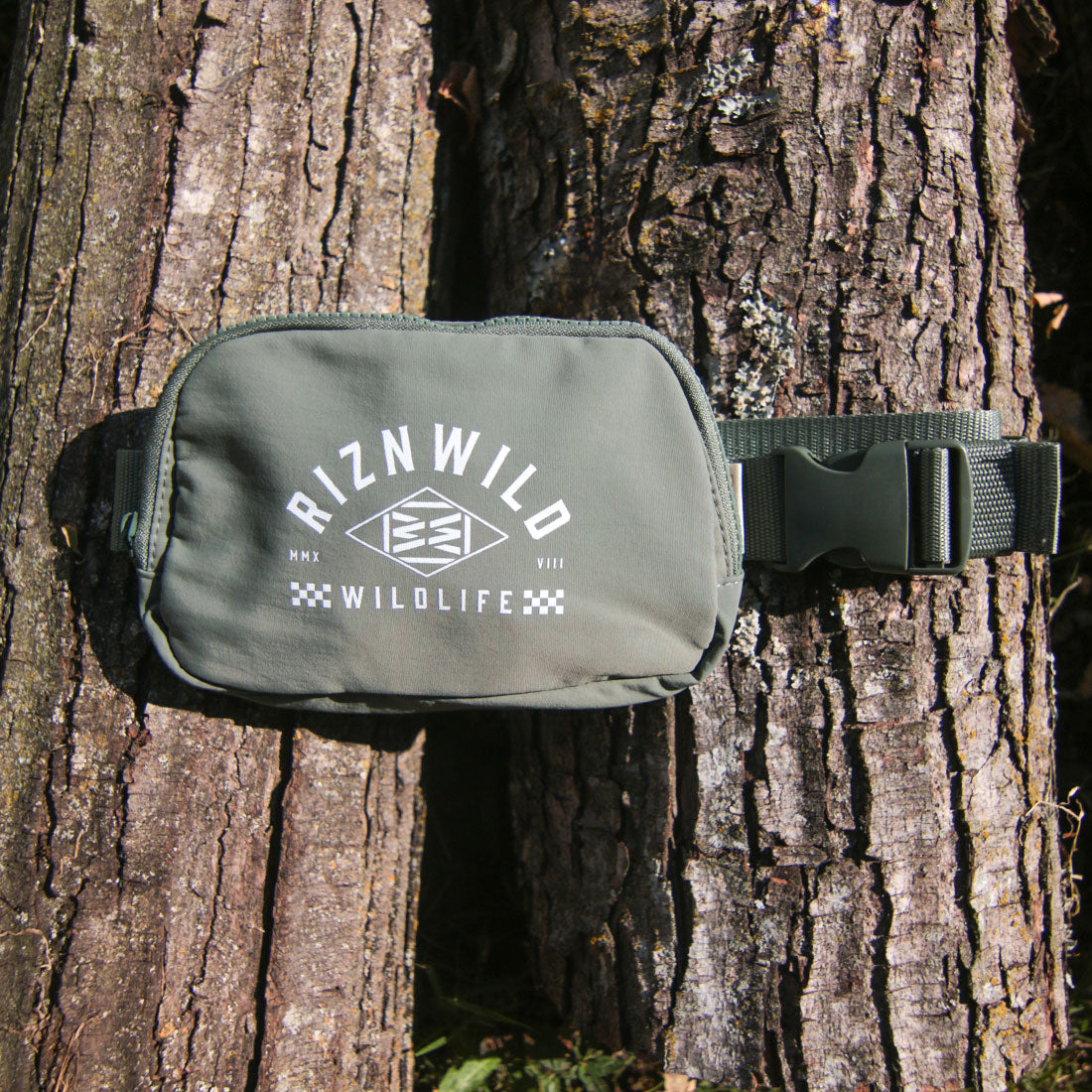 Close-up of the Icon crossbody bag in moss green