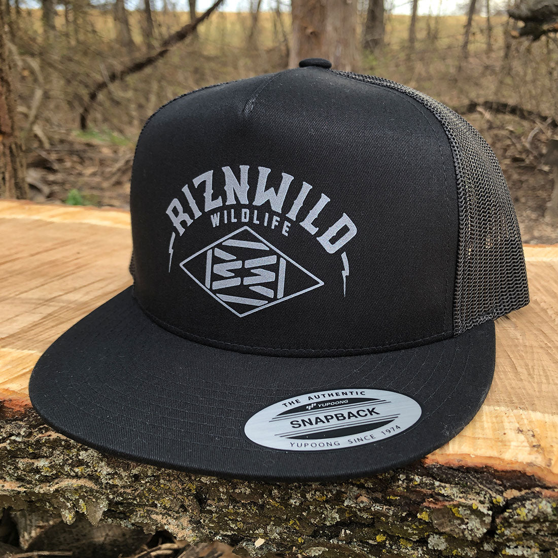 Legend Flat Bill Trucker Hat in Black