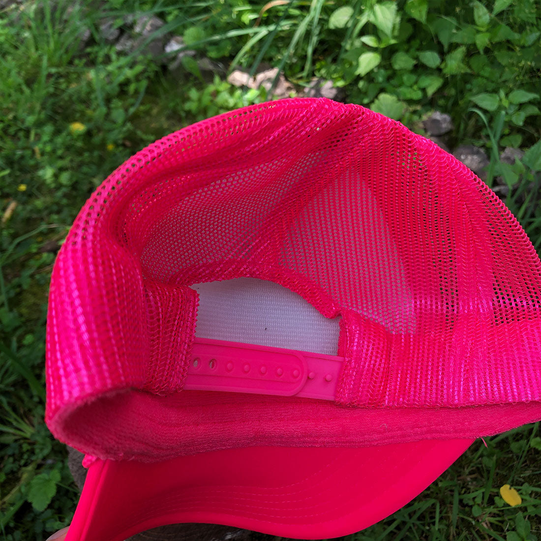 Icon Curved Bill Foam Front Trucker Hat in White/Neon Pink
