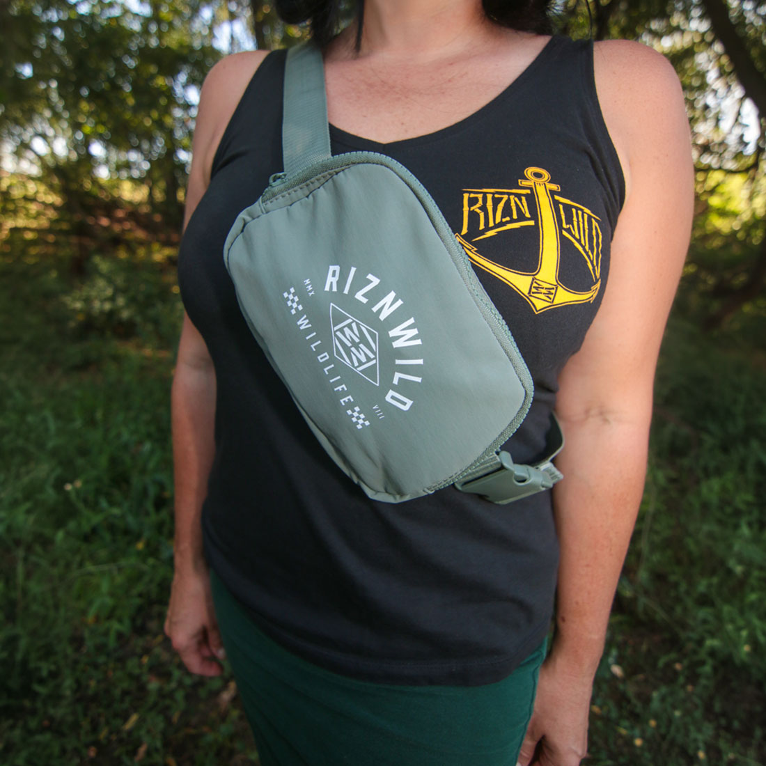 Moss green RIZNWILD crossbody bag worn across the chest