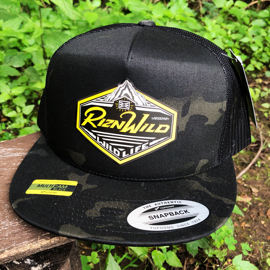 multicam trucker hat, black camo flat bill hat, RIZNWILD snapback, mesh back cap, outdoor camo hat, adventure trucker hat, men’s camo hat, bold patch hat