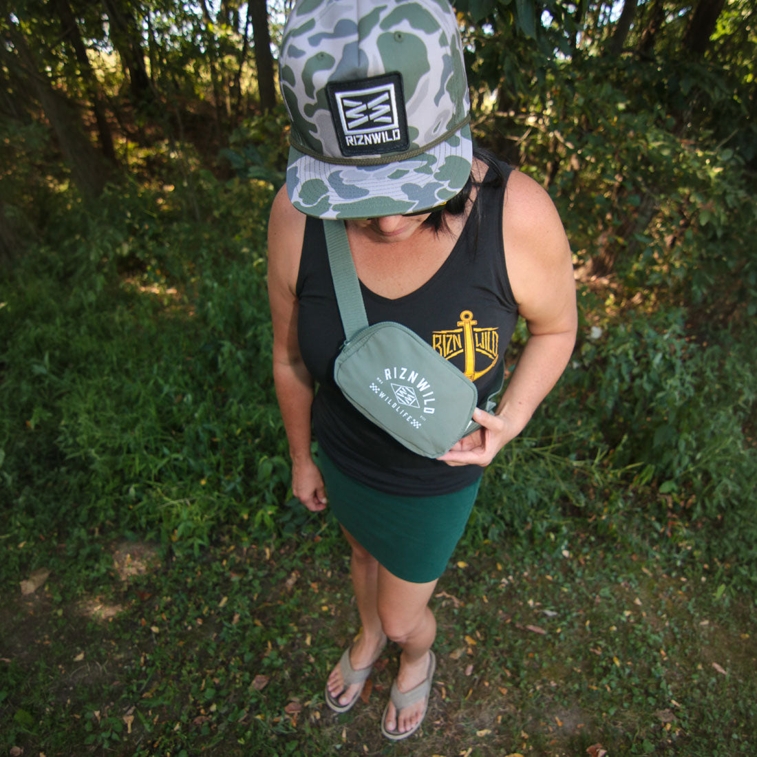 RIZNWILD moss crossbody bag styled with outdoor apparel