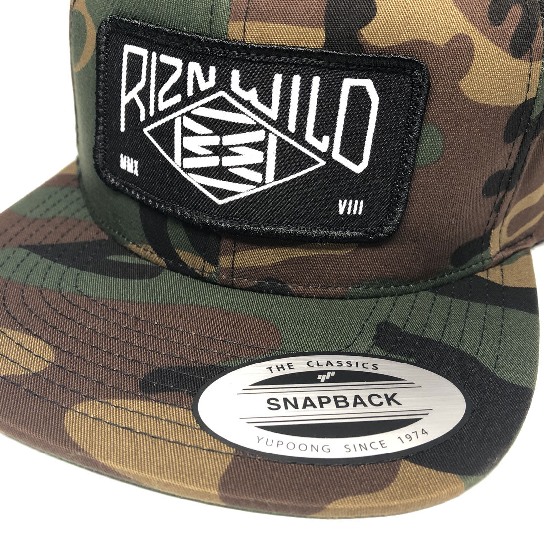 RIZNWILD | Patch sewn on camo snap back trucker hat