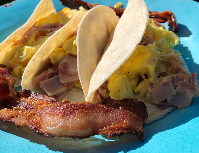 Camping food Breakfast ham, egg, and cheese tacos, with bacon | RIZNWILD